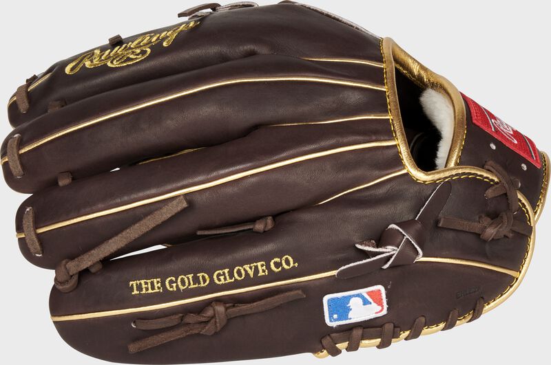 Mocha finger backs of a Rawlings Pro Preferred Manny Machado glove with the MLB logo on the pinky - SKU: PROSNP7-MM13 loading=