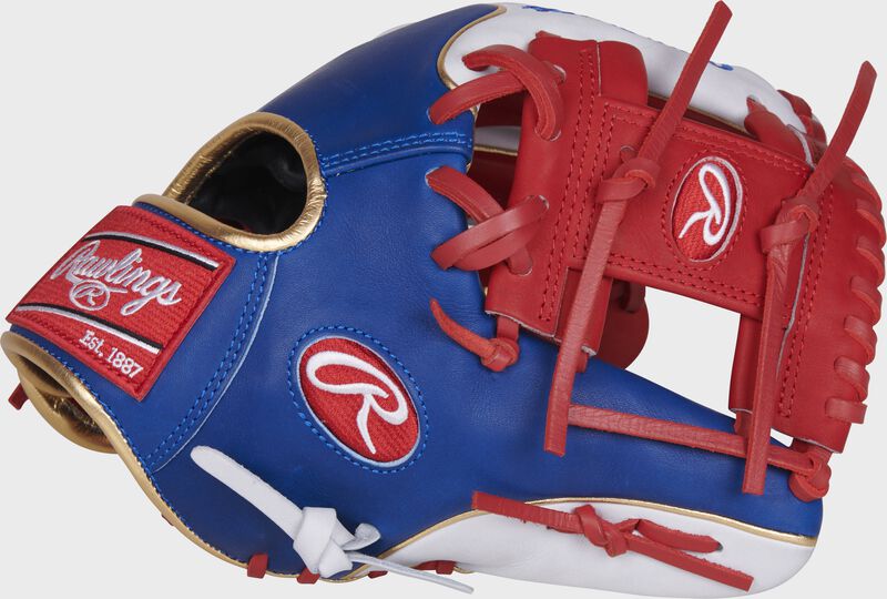 Thumb of a royal/white PRO204W-2SRW Heart of the Hide 11.5-Inch MLB infield glove with a scarlet I-web