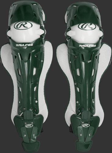 A pair of adult dark green Rawlings Mach catcher's leg guards with white accents - SKU: MCHLGA-DG