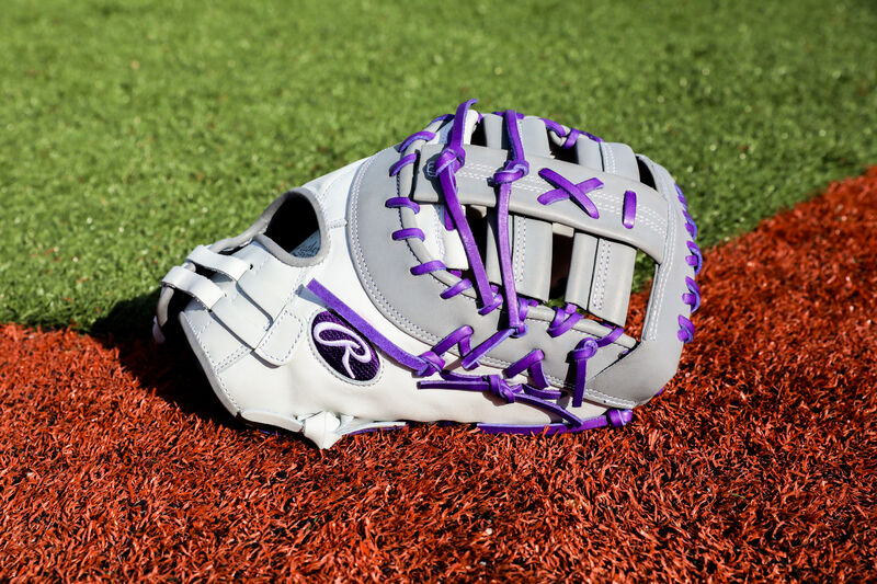 A white/gray/purple Liberty Advanced 1st Base mitt on a field - SKU: RLADCTSBWPG