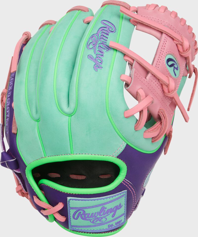 Mint back of a Heart of the Hide ContoUR Fit 11.5-Inch Infield Glove with a mint leather Rawlings patch