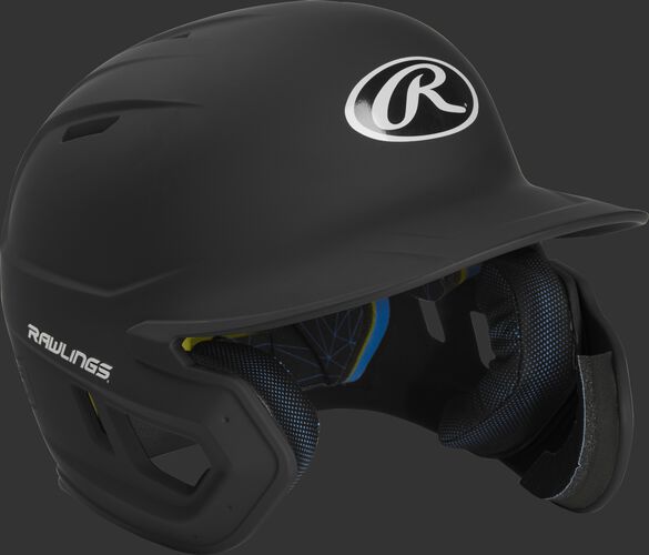 Right angle view of a MACHEXTR Rawlings Mach EXT junior helmet with a one-tone matte black shell