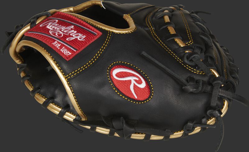 Thumb of a black R9 Series 27-Inch catcher's training mitt with a black 1-piece solid web - SKU: R9TRCM