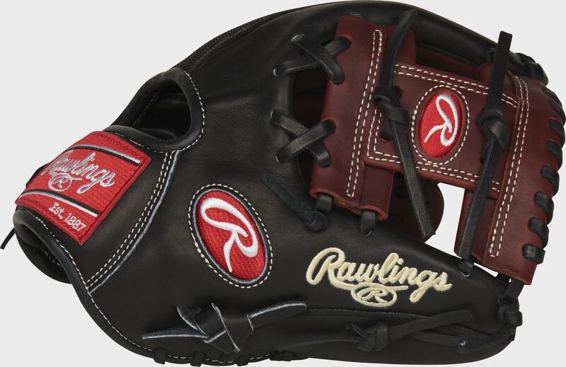 Thumb of a black PRO1125-2PMP Heart of the Hide 11.25-inch mesh infield glove with a dark sherry I-web