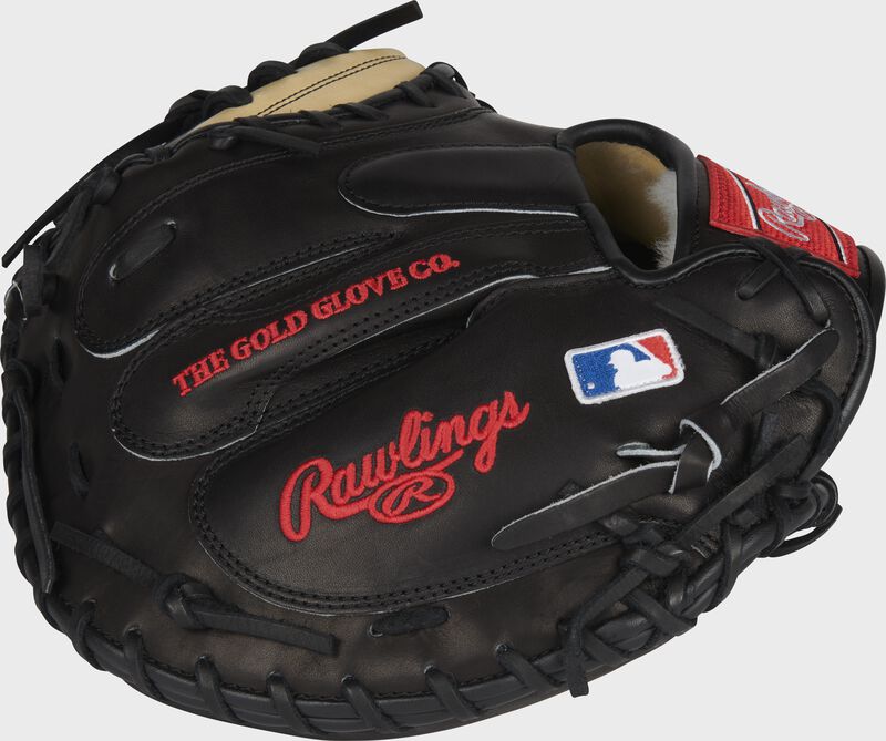 A black Pro Preferred catcher's mitt with the MLB logo on the pinky - SKU: PROSCM43JR10