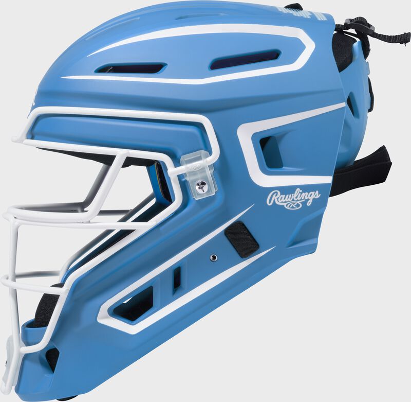 Left side of a Columbia blue Rawlings Mach Pro Series catcher's helmet loading=