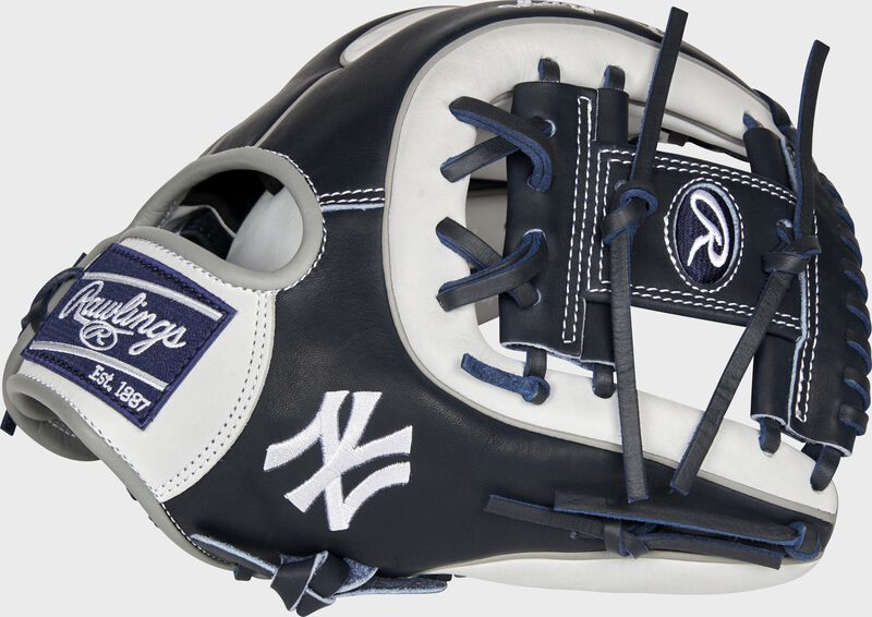 Web back view of navy and white 2021 New York Yankees Heart of the Hide glove