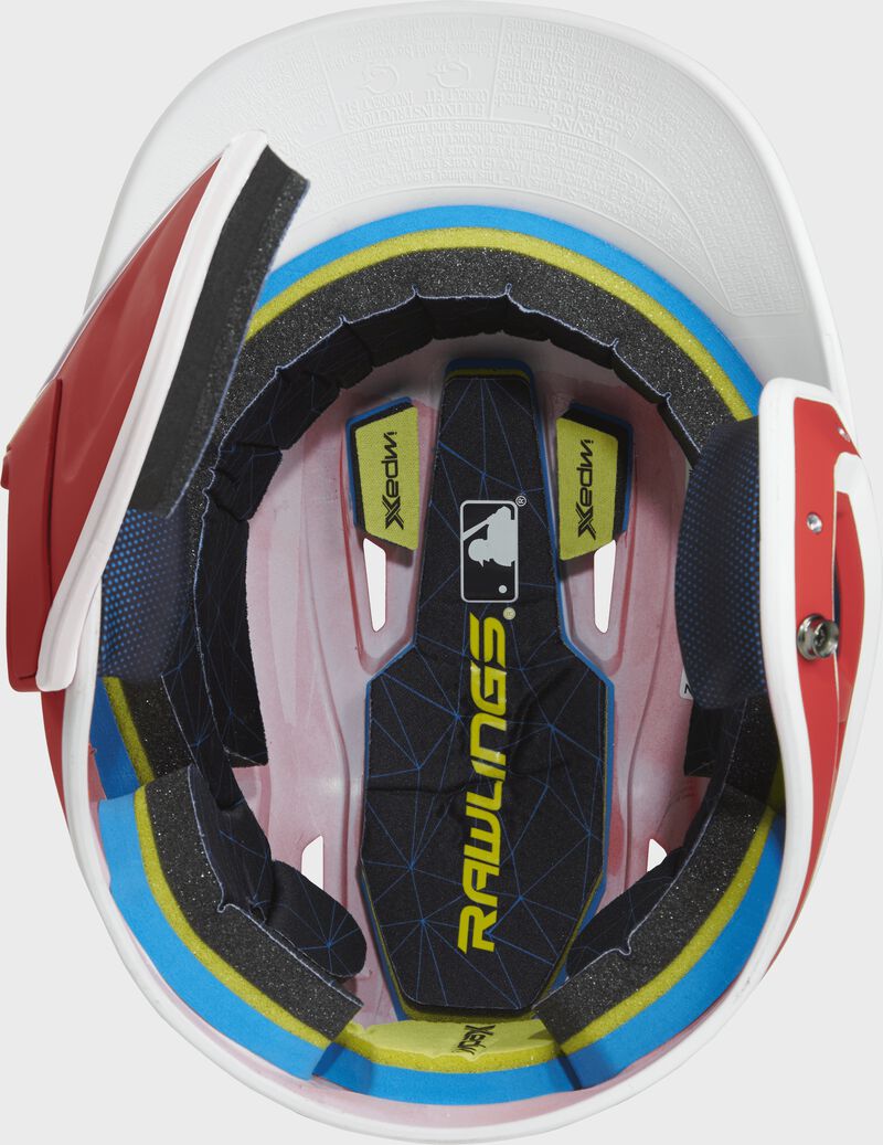 Inside of a MACHEXTR Rawlings MACH baseball helmet with IMPAX durable foam padding