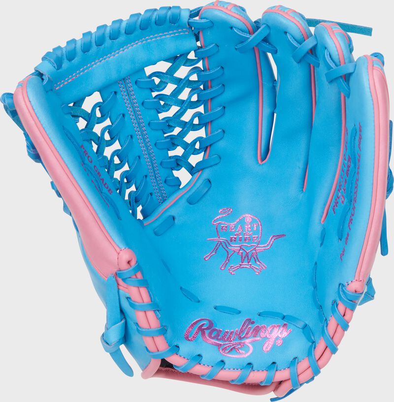 Palm of a Columbia blue Heart of the Hide 12.75-Inch Modified Trap-Eze Web Glove with pink stamping