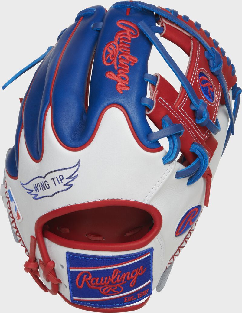 White/royal Wing Tip back of a Heart of the Hide R2G 11.5" I-web glove with a royal Rawlings patch - SKU: PROR204W-2SRW loading=