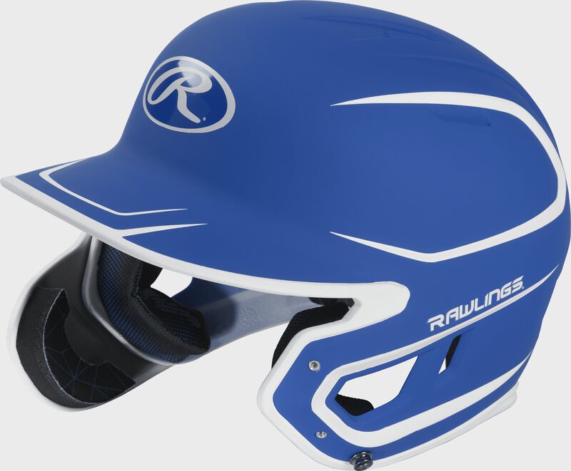 Left angle view of a MACHEXTR Rawlings Mach EXT Junior helmet with a two-tone matte royal/white shell