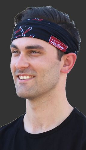 A guy wearing a black stitch multi-functional neck gaiter as a head band - SKU: RC40001-001