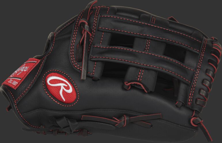 Thumb view of a black R9YPT6-6B R9 Series 12-inch youth outfield glove with a black H web