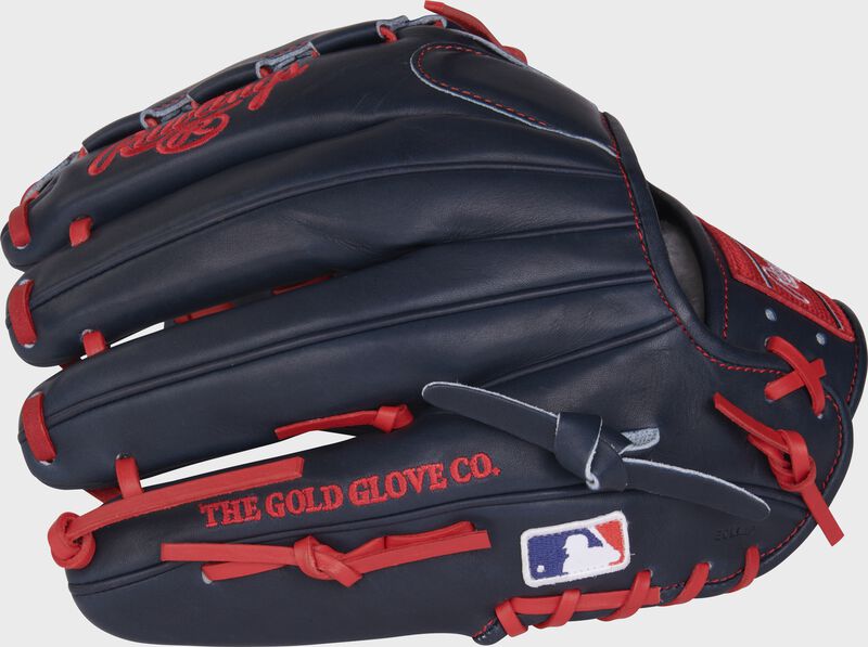Back of a navy Griffin Canning Pro Preferred glove with the MLB logo on the pinky - SKU: RSGRPROS19-11GC