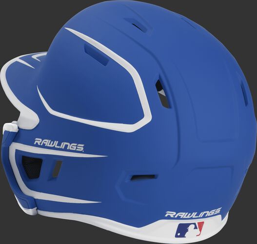Back left view of a matte royal/white MACHEXTR MACH series two-tone batting helmet with air vents