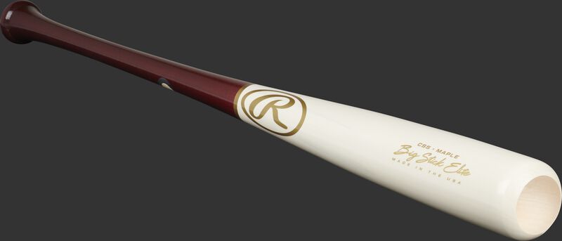 Angled view of a white wash/wine red Big Stick Elite Maple bat with a cupped end - SKU: CS5RMW