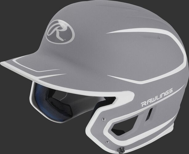 Left angle view of a Rawlings MACH Junior helmet with a two-tone matte silver/white shell