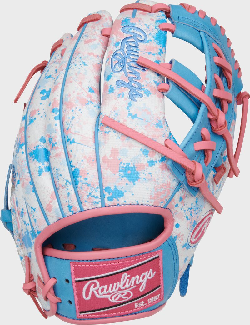 White and pink/columbia blue splatter print Speed Shell back of a Heart of the Hide 11.5" infield glove