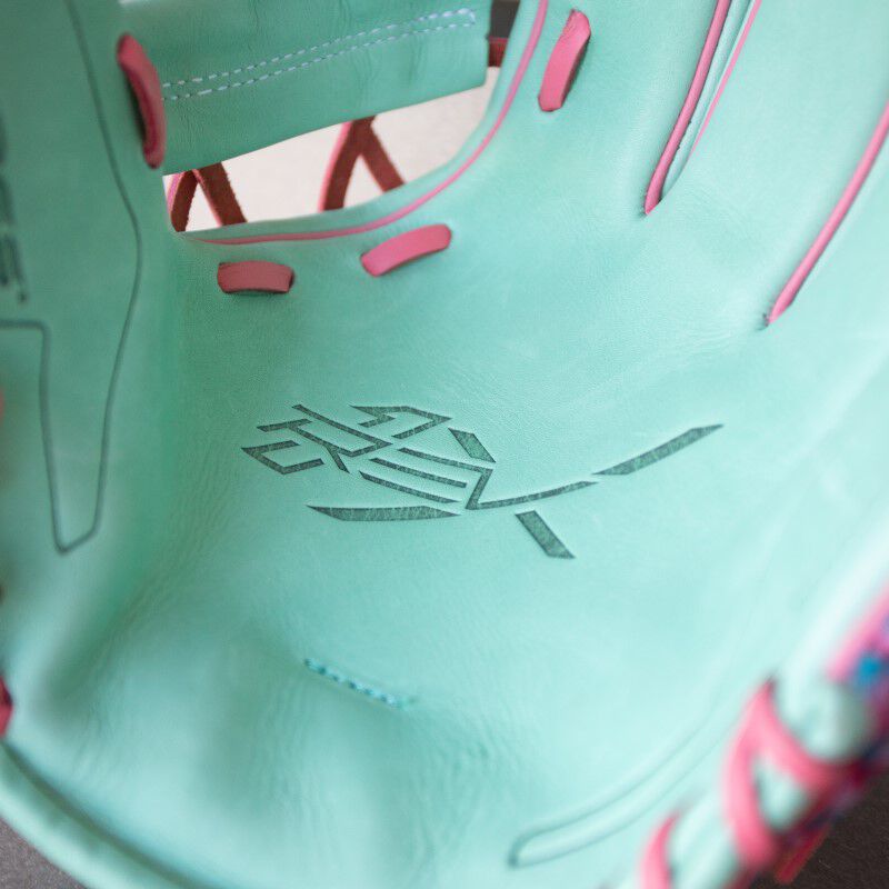 REV1X stamp on the mint leather palm of a REV1X ColorSync glove