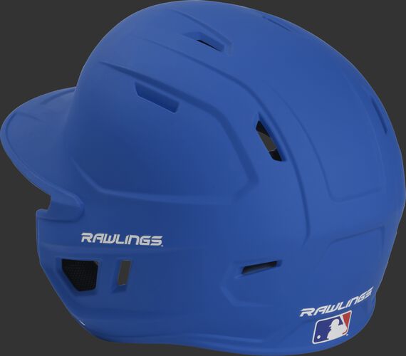 Back left view of a matte royal MACHEXTL MACH series batting helmet with air vents