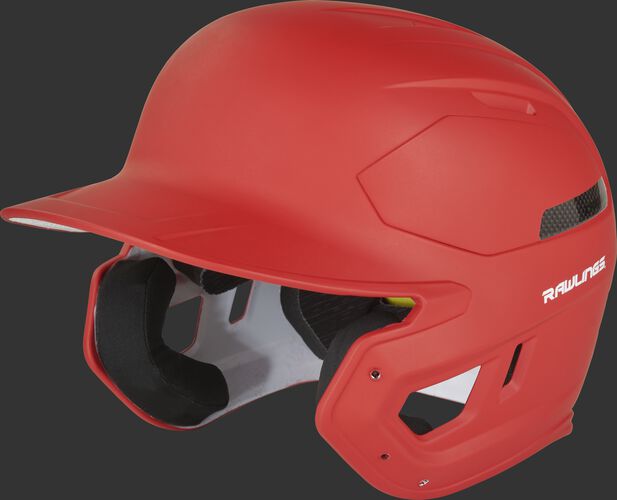 Left angle view of a matte scarlet CAR07A MACH Carbon high school/college batting helmet