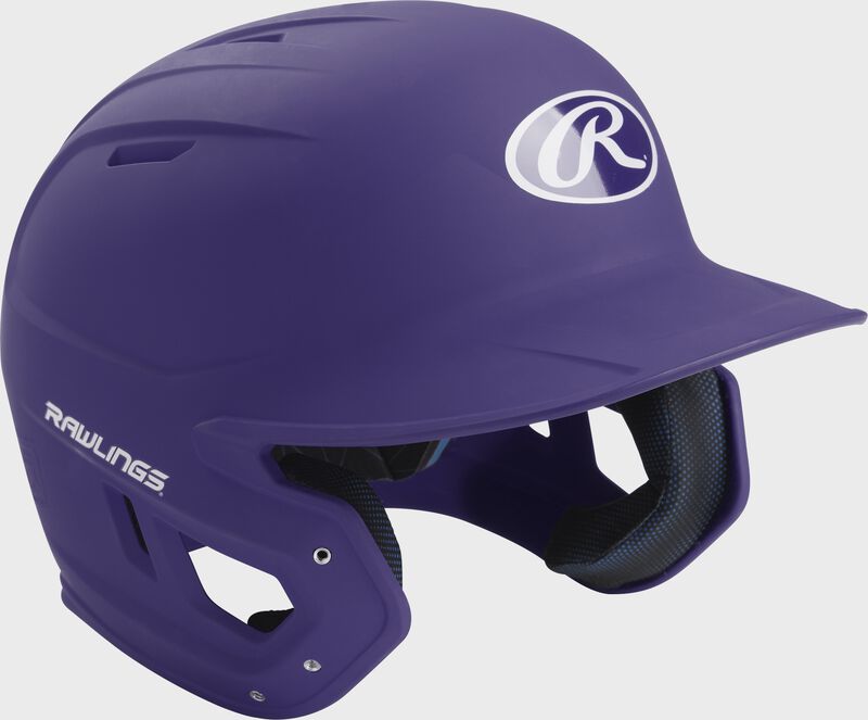 Right angle view of a matte MACH batting helmet with a purple shell
