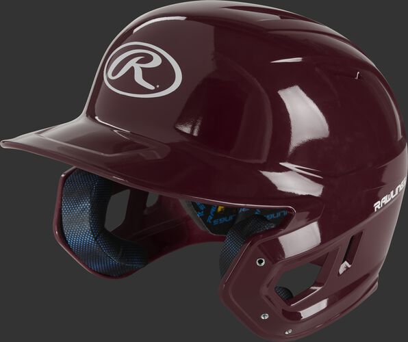 Front left of a maroon MCH01A Mach high school batting helmet