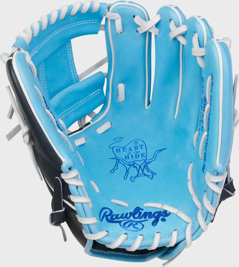 Columbia blue palm of a Rawlings Heart of the Hide 11.75-Inch Wing Tip Infield Glove with royal stamping and white laces