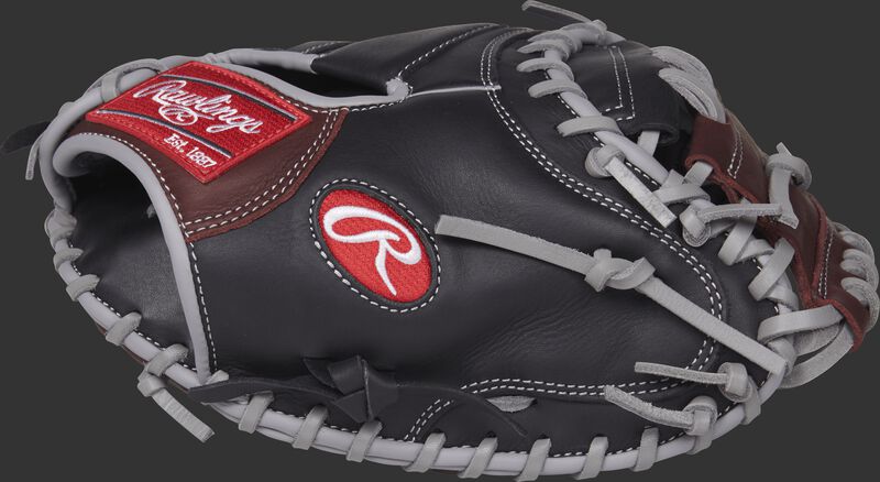 Thumb view of a black R9CM325BSG R9 Series 32.5-inch catcher's mitt with a dark sherry one-piece solid web