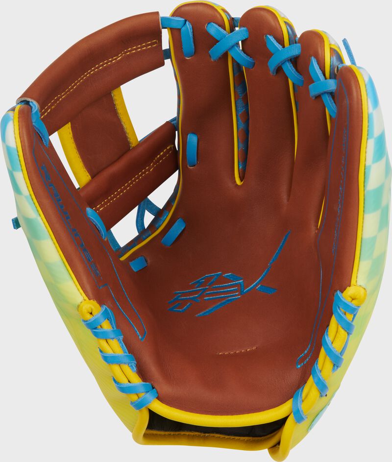 Golden brown leather palm of a Rawlings REV1X Race Day glove