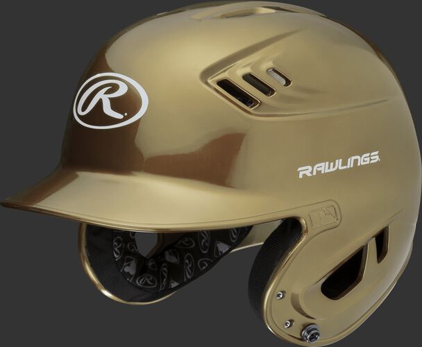 A metallic vegas gold R16S Velo senior batting helmet with Cool-Flo vents
