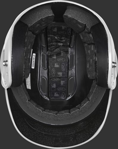 Inside of a white R1601 Velo batting helmet with black foam padding