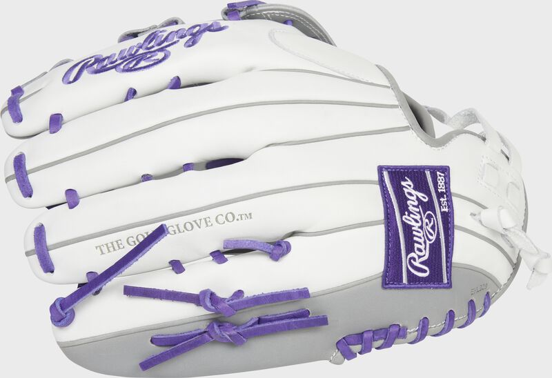 Back of a white/purple Liberty Advanced Color Series 12.75-Inch outfield glove with a purple Rawlings patch - SKU: RLA1275SB-6WPG loading=