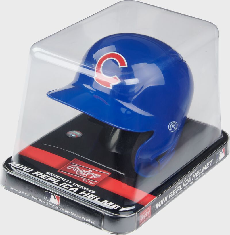 A blue Chicago Cubs mini replica helmet in a clear packaging case