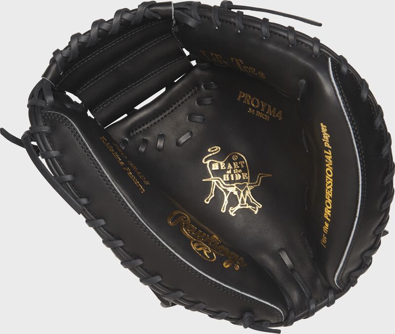 PROYM4 34-inch Heart of the Hide catcher's mitt with a black palm and black laces