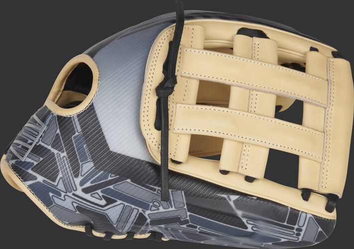 Thumb of a black/camel 2022 REV1X 12.75-Inch outfield glove with a sublimated design on the thumb and camel H-web - SKU: REV3039-6