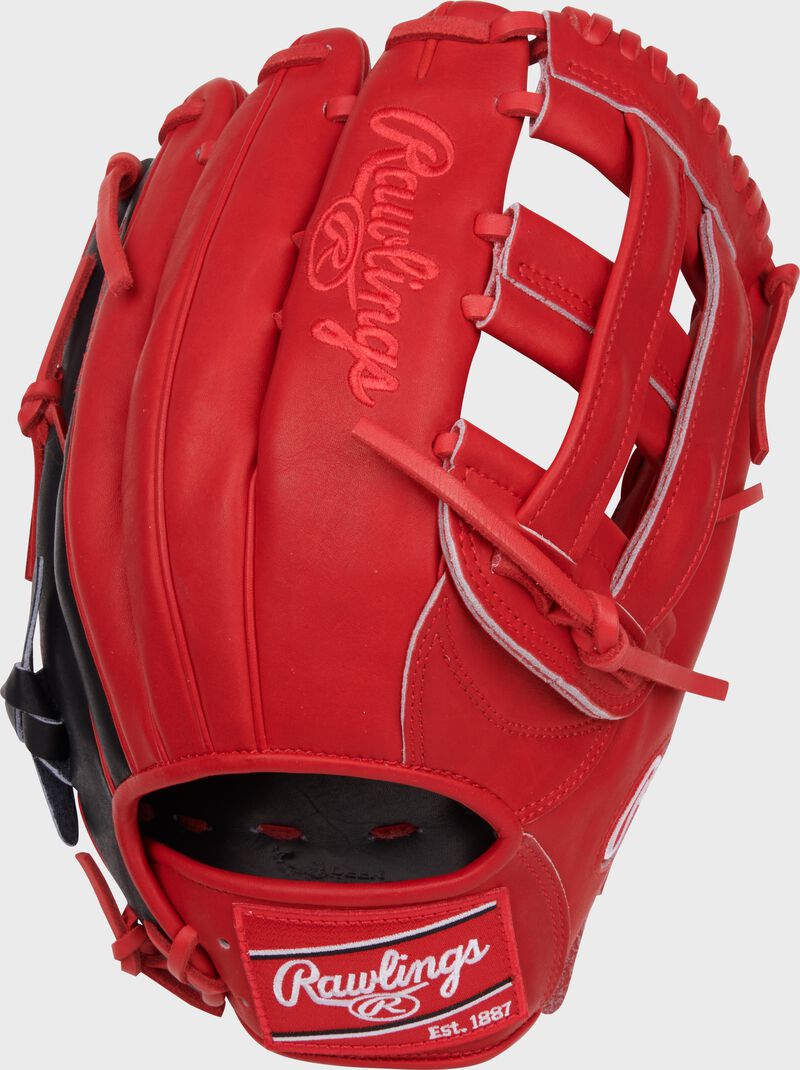 Scarlet back of a Corbin Carroll Heart of the Hide Outfield Glove with a red Rawlings patch