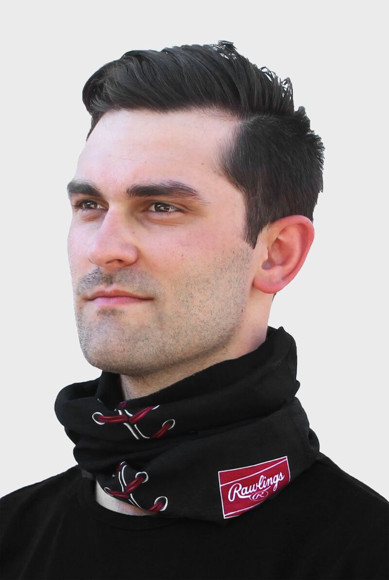 A guy wearing a Rawlings black stitch gaiter around his neck - RC40001-001 loading=