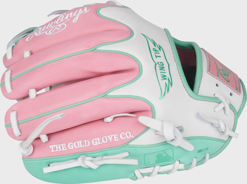 Pink/white back of a Heart of the Hide 11.5" Wing Tip glove with the MLB logo on the pinky