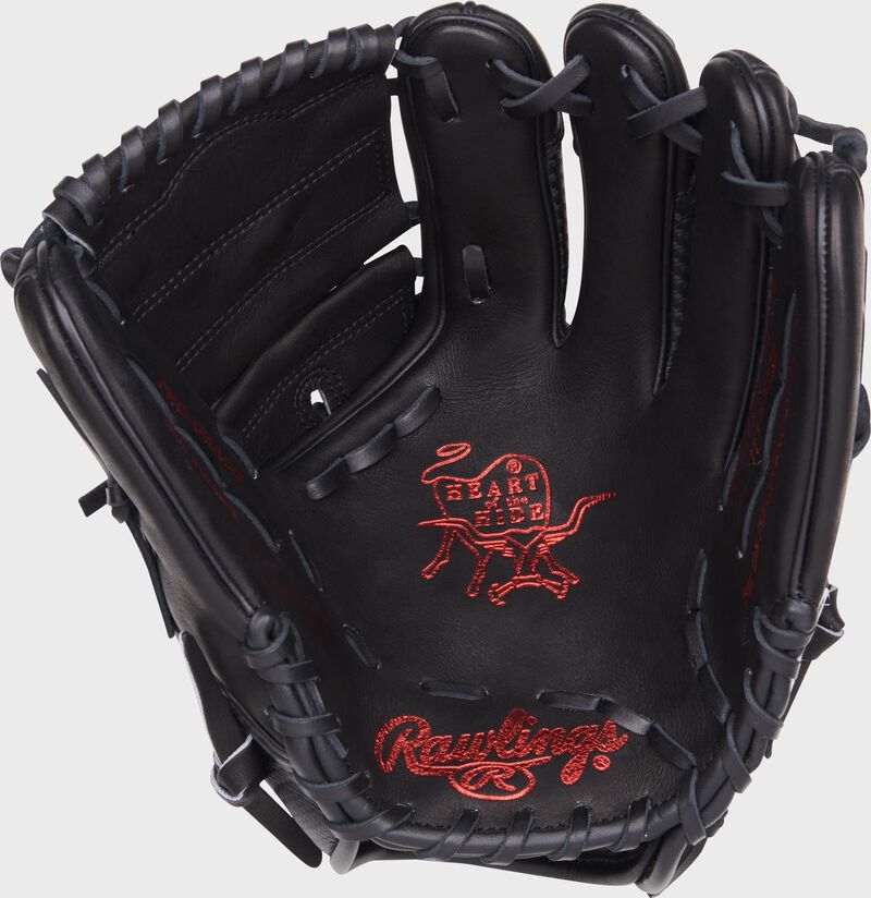 Black palm of a Rawlings Heart of the Hide Hyper Shell glove with red stamping and black laces