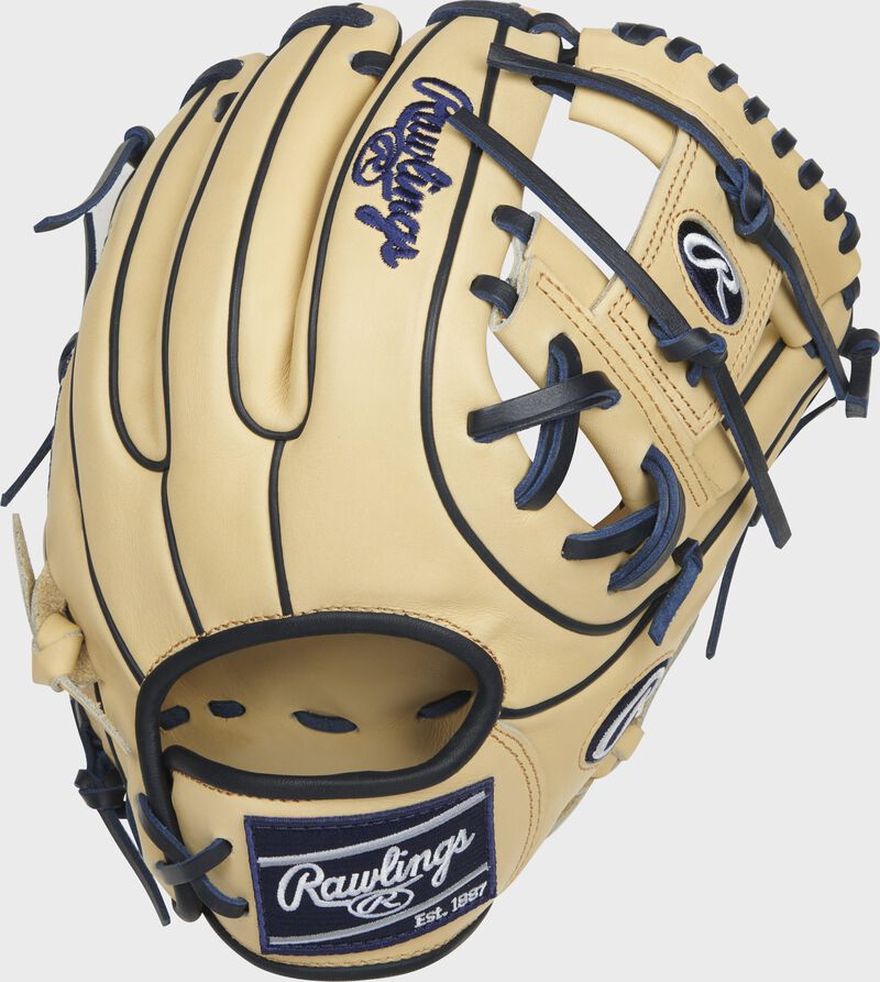Back of a camel Heart of the Hide R2G ContoUR fit I-web glove with a navy Rawlings patch - SKU: PROR234U-2C loading=