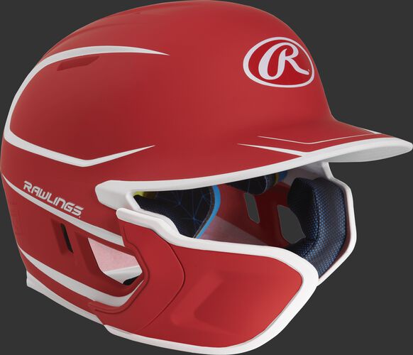 Right angle view of a matte scarlet/white MACHEXTR Mach Senior helmet with Mach EXT left hand batter face guard extension