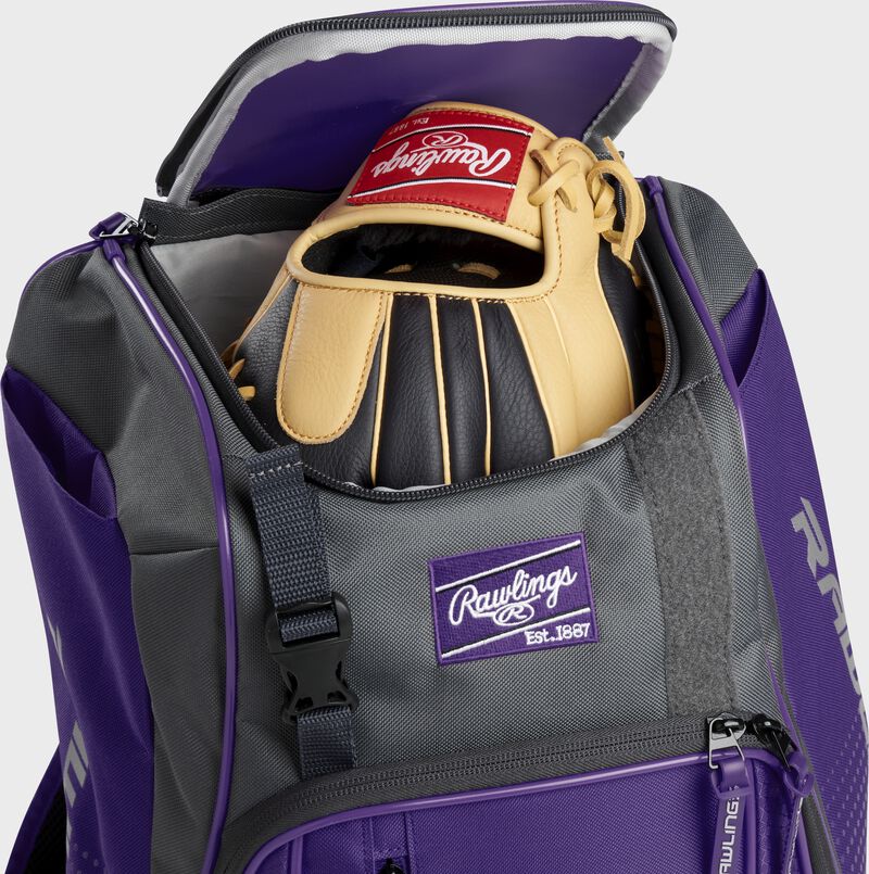 A Rawlings baseball glove in the top compartment of a Franchise baseball backpack - SKU: FRANBP-PU