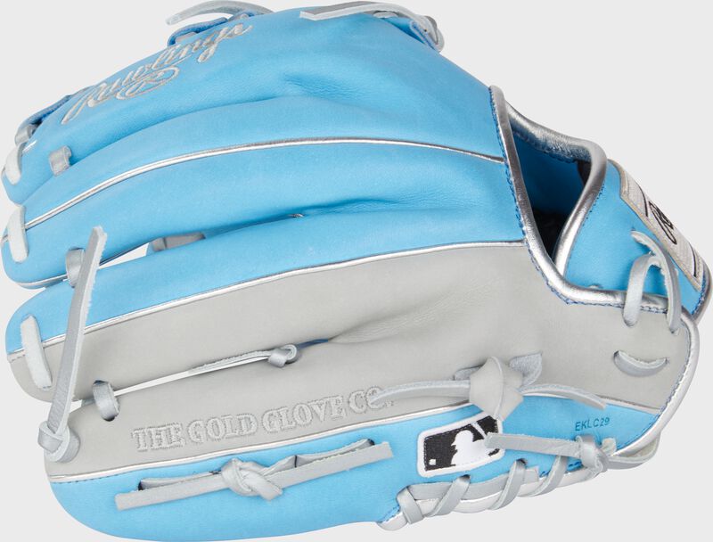 Columbia blue/gray back of a Heart of the Hide ContoUR Fit 11.5" infield glove with the MLB logo on the pinky