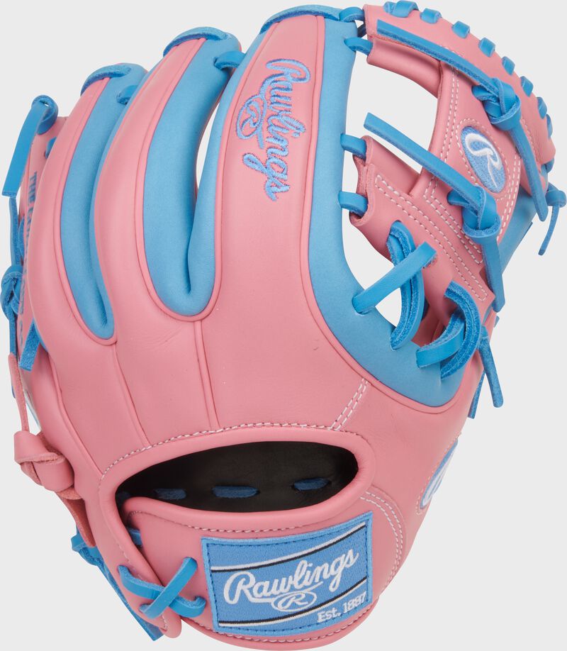Back of a pink/Columbia blue Rawlings NXT Series 11.5-Inch Infield Glove with a Columbia blue Rawlings patch loading=