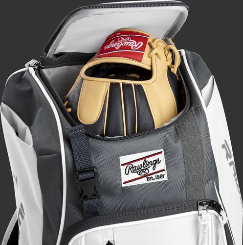 A Rawlings baseball glove in the top compartment of a Franchise baseball backpack - SKU: FRANBP-W