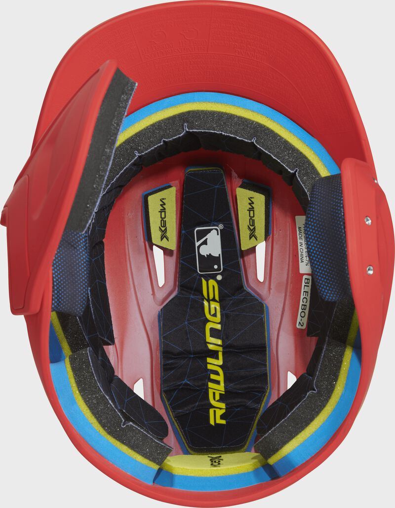 Inside of a MACHEXTL Rawlings MACH baseball helmet with IMPAX durable foam padding loading=
