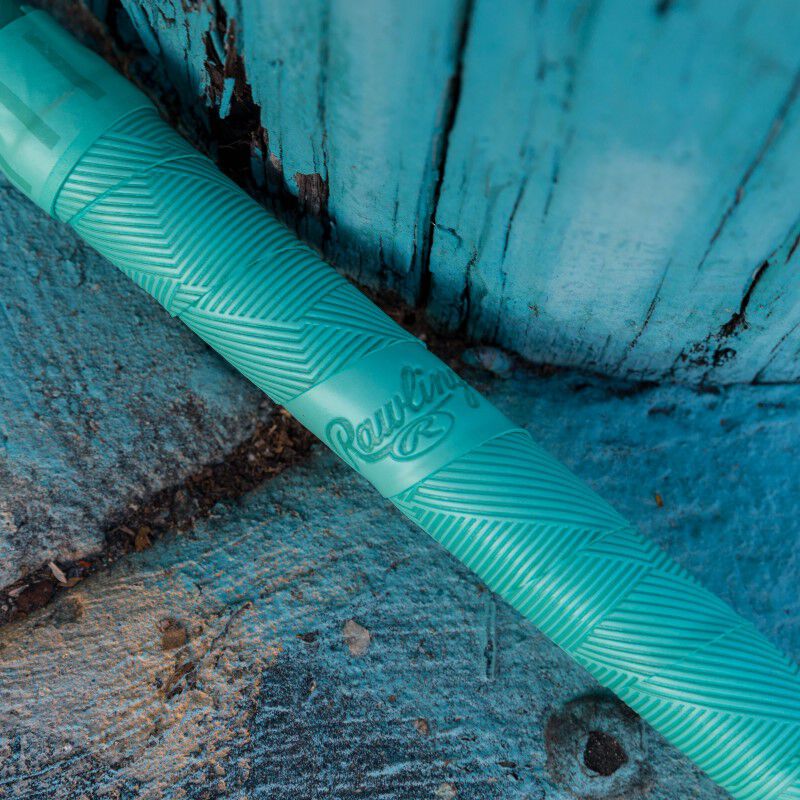 Grip of a Rawlings Mach AI BBCOR baseball bat on the ground - SKU: RBB4MC3