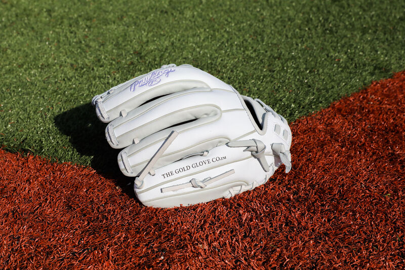 Back of a white Rawlings Liberty Advanced Color Series infield glove on a field - SKU: RLA715SB-31WSS loading=
