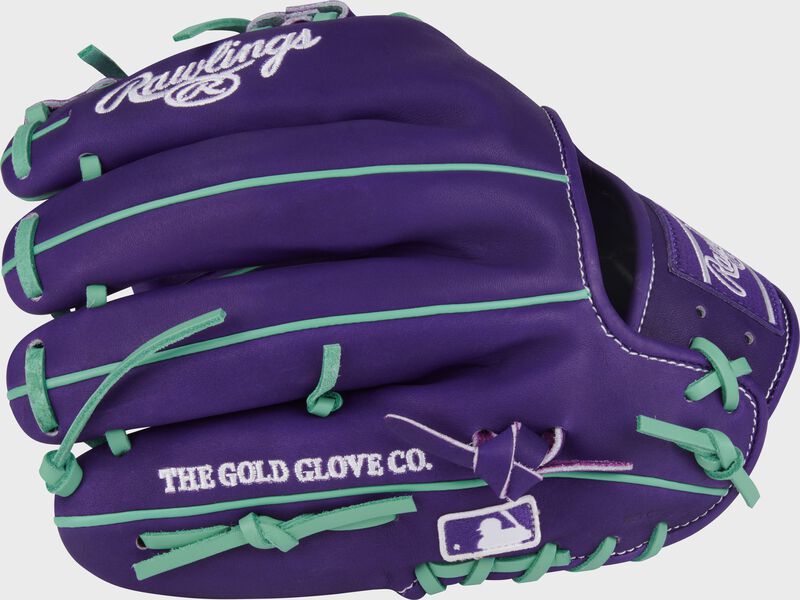 Back of a Heart of the Hide 11.5-Inch Purple Infield Glove with the MLB logo on the pinky